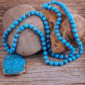 NWT Long Turquoise Necklace with gold coat around main stone pendant KNO…